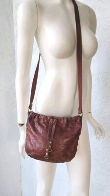 Vintage Fossil Small Studded Brown Leather Faux Drawstring Crossbody Bag - Image 1 of 4