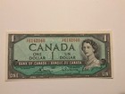 1954 SIGNATURES DÉCALÉES DU Canada + billet non centré - Un billet de 1 $ non circulé