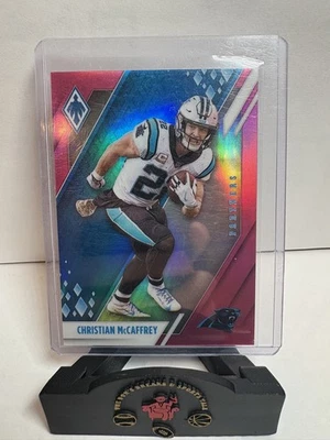 2021 Panini Phoenix #18 Christian McCaffrey Pink #/199 - Image 1 of 2