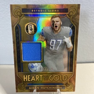 2023 PANINI GOLD STANDARD SP AIDAN HUTCHINSON HEART OF GOLD JERSEY #/199