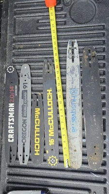 Toneladas de piezas de motosierra - barras, cadenas, carburadores, romper y reparar Foto 1 de 4