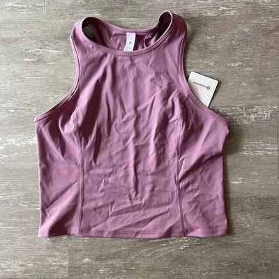 Camiseta sin mangas recortada Lululemon Nulux Racerback talla 12 nueva con etiquetas lavanda Lux rosa púrpura Foto 1 de 4