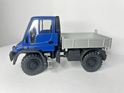 Welly 22098 Mercedes Benz UNIMOG U400 azul 1:43 sin embalaje original Foto 1 de 4
