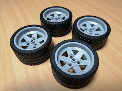 LEGO Technik 4 Stück Reifen 68.8 x 36 ZR hellgraue Felge / TECHNIC Sammlung - Bild 1 von 4