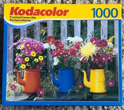 Kodacolor Enamel Pot Jigsaw Puzzle 1000 Piece Flowers Bouquet Fence Kodak - Image 1 of 3