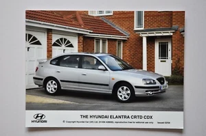 Foto stampa auto - Hyundai Elantra CRTD CDX 2004 - metallizzata - vista anteriore/laterale - Foto 1 di 1
