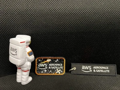 Lot AWS Amazon Aerospace & Satellite Items Astronaut Stress Ball Patch Keychain - Image 1 of 4