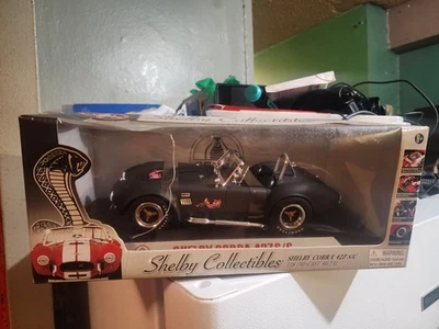 Литой металлический автомобиль Shelby Collectibles DC42702 черный масштаб 1:18 Shelby Cobra 427 - Изображение 1 из 4