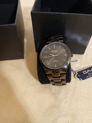 OMAX HOMBRE ELEGANTE ESFERA NEGRA Y BANDA NEGRA DELGADA ACERO INOXIDABLE RESISTENTE AL AGUA Foto 1 de 4