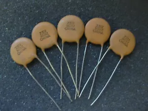 CONDENSADOR DE DISCO 0.30UF 600V Z5U CENTRALAB DD303 DD-303 (LOTE DE 5) - Imagen 1 de 4