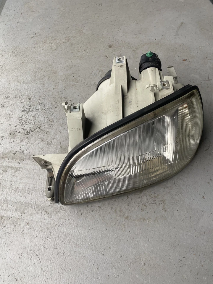 CABEZAL RENAULT CLIO FARO MANO IZQUIERDA LADO DEL PASAJERO 1996-1998 Foto 1 de 2