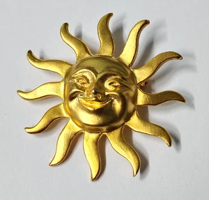 Broche Sol Tono Dorado Estilo Penda - Imagen 1 de 4