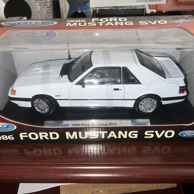 NEW WELLY 1986 FORD MUSTANG SVO WHITE 1/18 DIECAST CAR  BEAUTIFUL VERY NICE CAR - Image 1 of 4