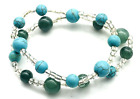 Bracelet extensible perlé double brin stations perles turquoise et vertes perles acryliques