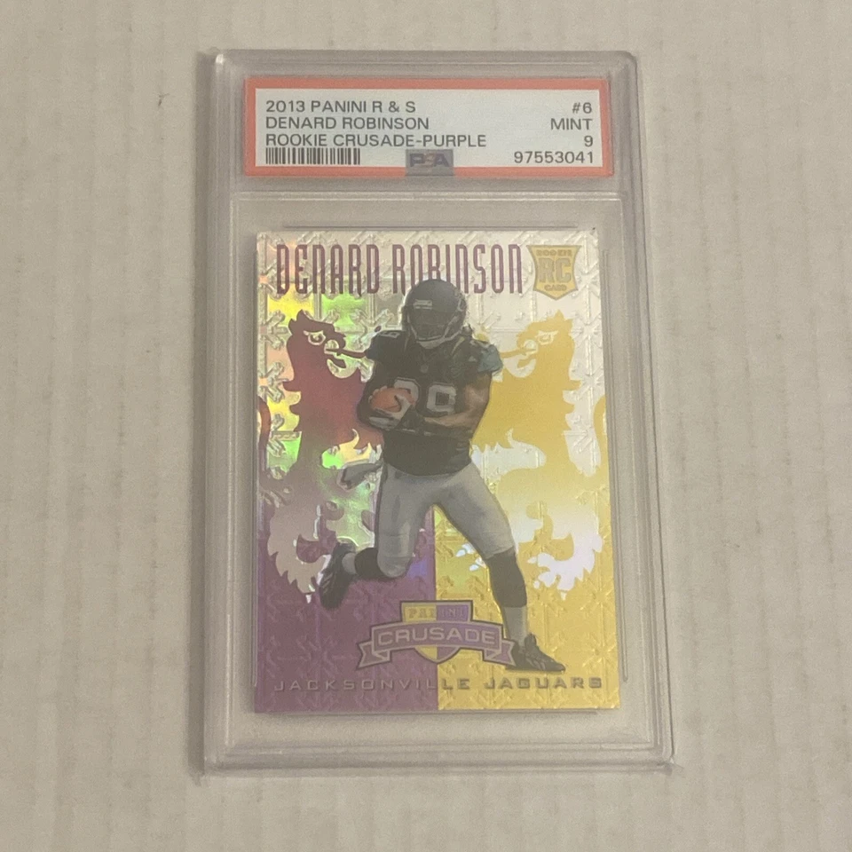 2013 Panini Rookies & Stars Denard Robinson Rookie Crusade Purple #32/49  PSA 9 - Image 1 of 2