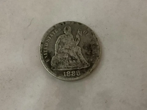 1888 seated liberty dime in circulated condition. 90 % silver Cover
