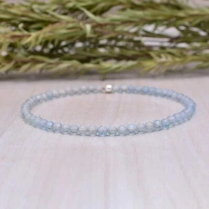 Brazalete de piedras preciosas elásticas de curación facetadas pequeñas redondas de topacio azul genuino de 7" - Imagen 1 de 8
