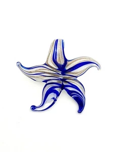 Colgante estrella de mar con incrustaciones de vidrio de arte de murano con lazo de fianza - Imagen 1 de 1