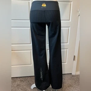 Pantalones de Yoga Nutti Yogini a Rayas Cintura Alta Pierna Ancha Atletismo Negros Talla S - Imagen 1 de 8