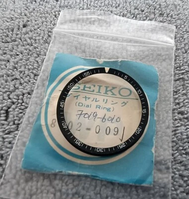 NOS GENUINE ROTATING DIAL RING FOR SEIKO 5 SPORTS 7019-6010  PARTS NO. 86020091 - Image 1 of 4