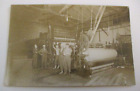 ANTIQUE PHOTOGRAPH of PAPER MILL WORKERS GATHERED AROUND A PAPER MACHINE ROLLER