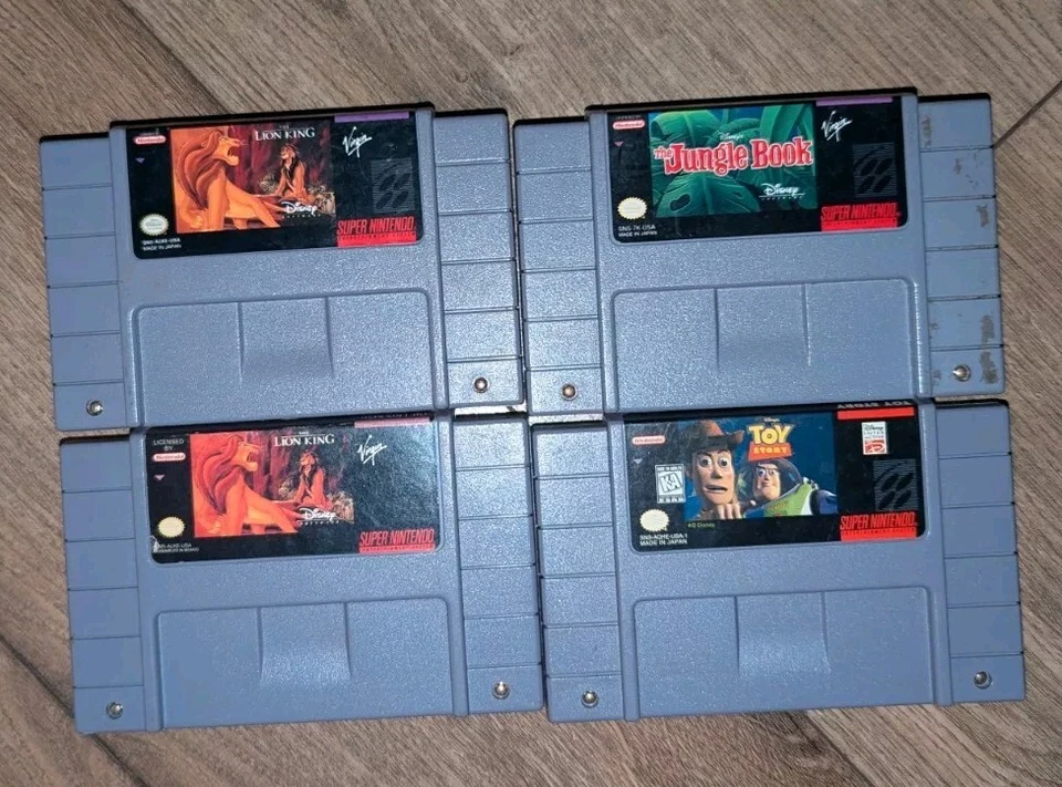 Super Nintendo Snes Game Bundle (Lion King, Jungle Book , And Toy Story) Tested - Image 1 of 2