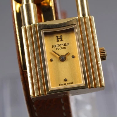 [Casi COMO NUEVO] HERMES Kelly Candado Esfera Dorada Cuarzo Mujer Reloj De Colección De JAPÓN Foto 1 de 4