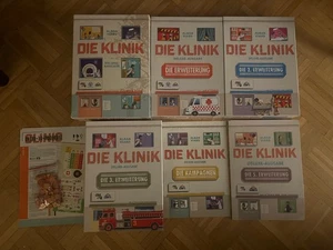 Klinik Deluxe + 5 Erweiterungen, Kampagnenbuch und Covid-19 Modul - Brettspiel - Bild 1 von 11