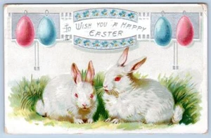 1910 TUCK'S HAPPY EASTER PINK & BLUE EGGS BUNNY RABBITS LIGHT EMBOSSING POSTCARD - Picture 1 of 2