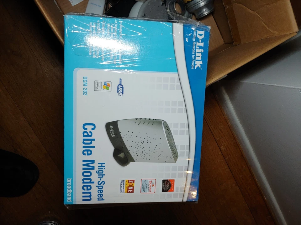 NEW D-Link DCM-202 Broadband Cable Modem Internet Windows Sealed Box w/cables - Image 1 of 1