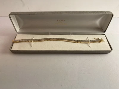 Brazalete de tenis con detalles de diamantes de oro de 18 k sobre plata de ley de 7 1/2 pulgadas de largo Foto 1 de 4