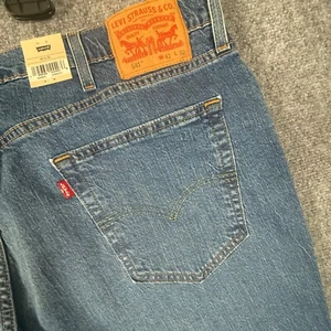 Levi's 541 Athletic Fit Jeans Stretch Denim Blue Men's Size 42x32 Casual NWT - Picture 1 of 10
