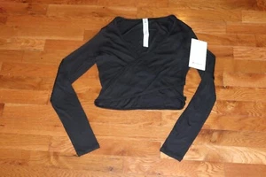 Neu mit Etikett lululemon geripptes Langarm-Top vorne Wickeloptik UVP 78!!! - Bild 1 von 16