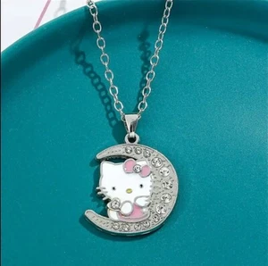 2024 HELLO KITTY Anhänger Halskette & HELLO KITTY Reversnadel sowohl neu als auch ungeöffnet - - Bild 1 von 7