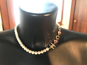chanel choker necklace with logo and pink heart