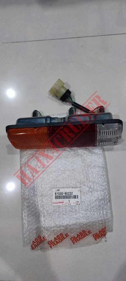 81550-60232 GENUINA TOYOTA LAND CRUISER LUZ TRASERA LÁMPARA FJ40 FJ43 FJ45 BJ40 Foto 1 de 1