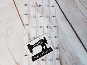 100 pack XS S M L XL - woven sew-in clothing size labels WHITE, Rubyjam Fabric - Picture 1 of 3