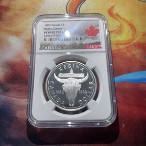 1982 NGC PF69UCAM CANADA SILVER DOLLAR REGINA 1882-1982 S$1 PR 69 ULTRA CAMEO - Picture 1 of 4