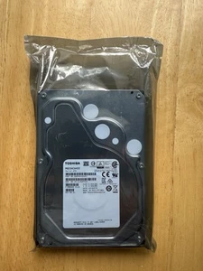Disque dur interne TOSHIBA 4 To MD04ACA400 HDEPQ00GEA51 3,5" SATA 6,0 Go 7200 tr/min - Photo 1/2