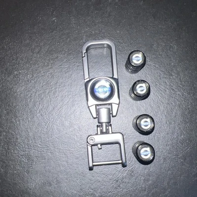 Tapones antipolvo llavero y válvula neumático coche moto aleación x 4 Volvo Foto 1 de 4