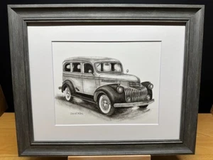 Disegno di un quadro schizzo a matita Chevrolet Suburban Carryall 2a generazione - Foto 1 di 17
