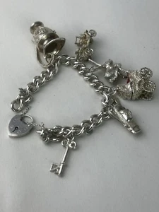 Vintage Sterling Silber Bettelarmband mit mehreren Charms weltweit erhältlich - Bild 1 von 13