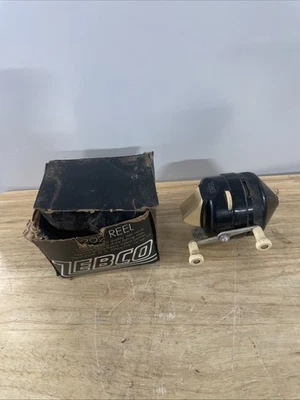 Carrete de pesca de pie de metal negro Zebco 202 vintage EE. UU. Foto 1 de 4