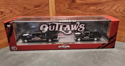 NEW M2 MACHINES WORLD OF OUTLAWS '73 GMC® SIERRA 3500 & '75 GMC SIERRA GRANDE 15 - Image 1 of 4