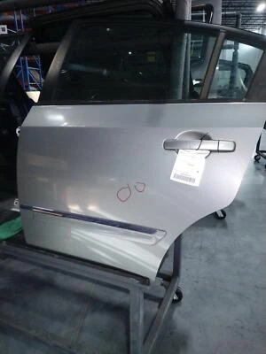 Nissan Sentra 2010 puerta trasera izquierda gris OEM 71955 usado 127 k millas Foto 1 de 2