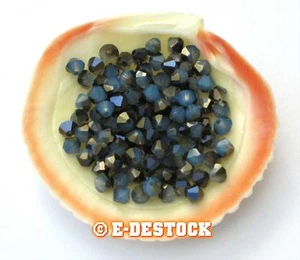 25 Perlen Toupies 4mm Swarovski Kristall - WEISS OPAL HIMMELBLAU - Bild 1 von 1