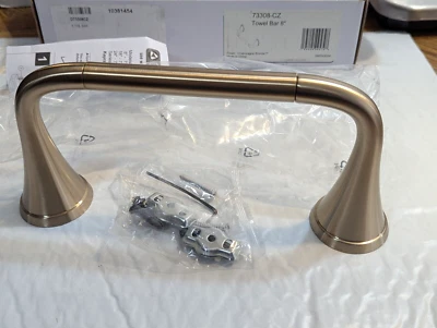 Toallero Delta 73308-CZ Kayra 8" montado en la pared, bronce champán $67 Foto 1 de 4