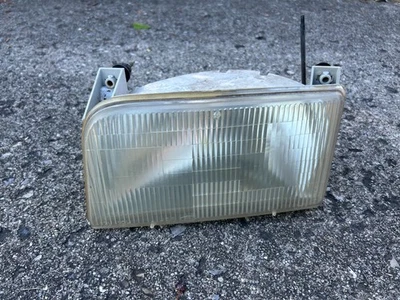 FARO DELANTERO IZQUIERDO FORD F150 F250 F350 92-1996 USADO CON AJUSTADOR Foto 1 de 4