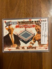A71,082 -  2005 Topps Heritage WWE Mat Ringside Relics #NNO JBL vs. Batista