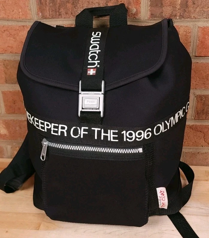Bolso Mochila Swatch Cronometrador de los Juegos Olímpicos 1996 Neopreno Negro De Colección  Foto 1 de 4